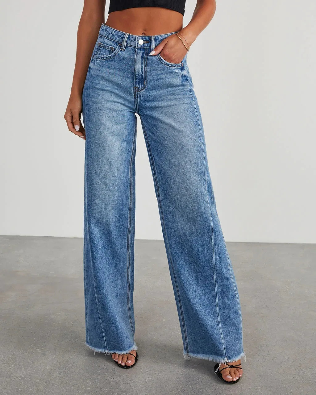 Loose fit jeans met rafelzoom Dames