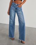 Loose fit jeans met rafelzoom Dames