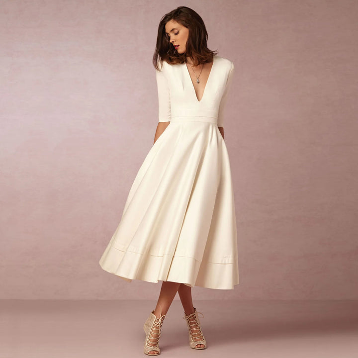 Bellezza – Elegante A-lijn Jurk met Diepe V-hals Dames