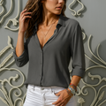 Damesblouse met knoopjes en kraag